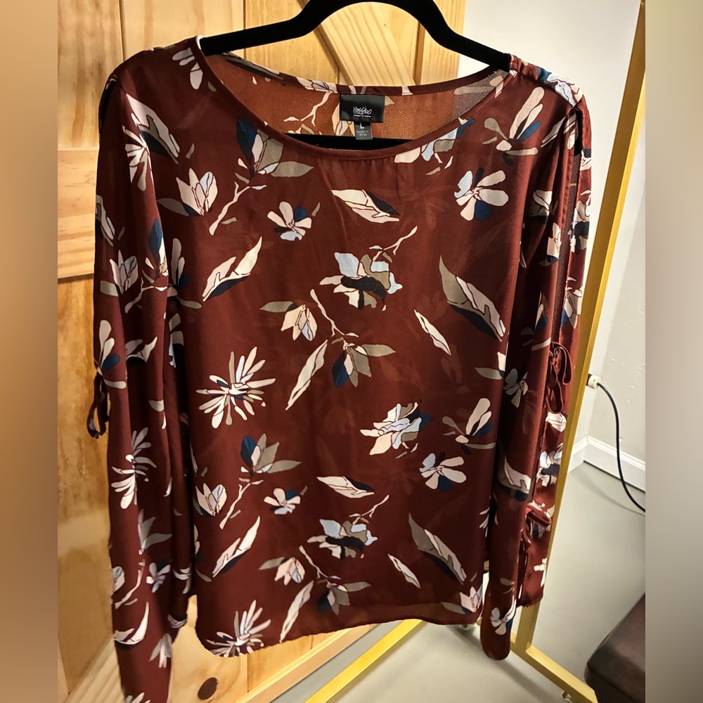 Brown floral blouse with ties on sleeve